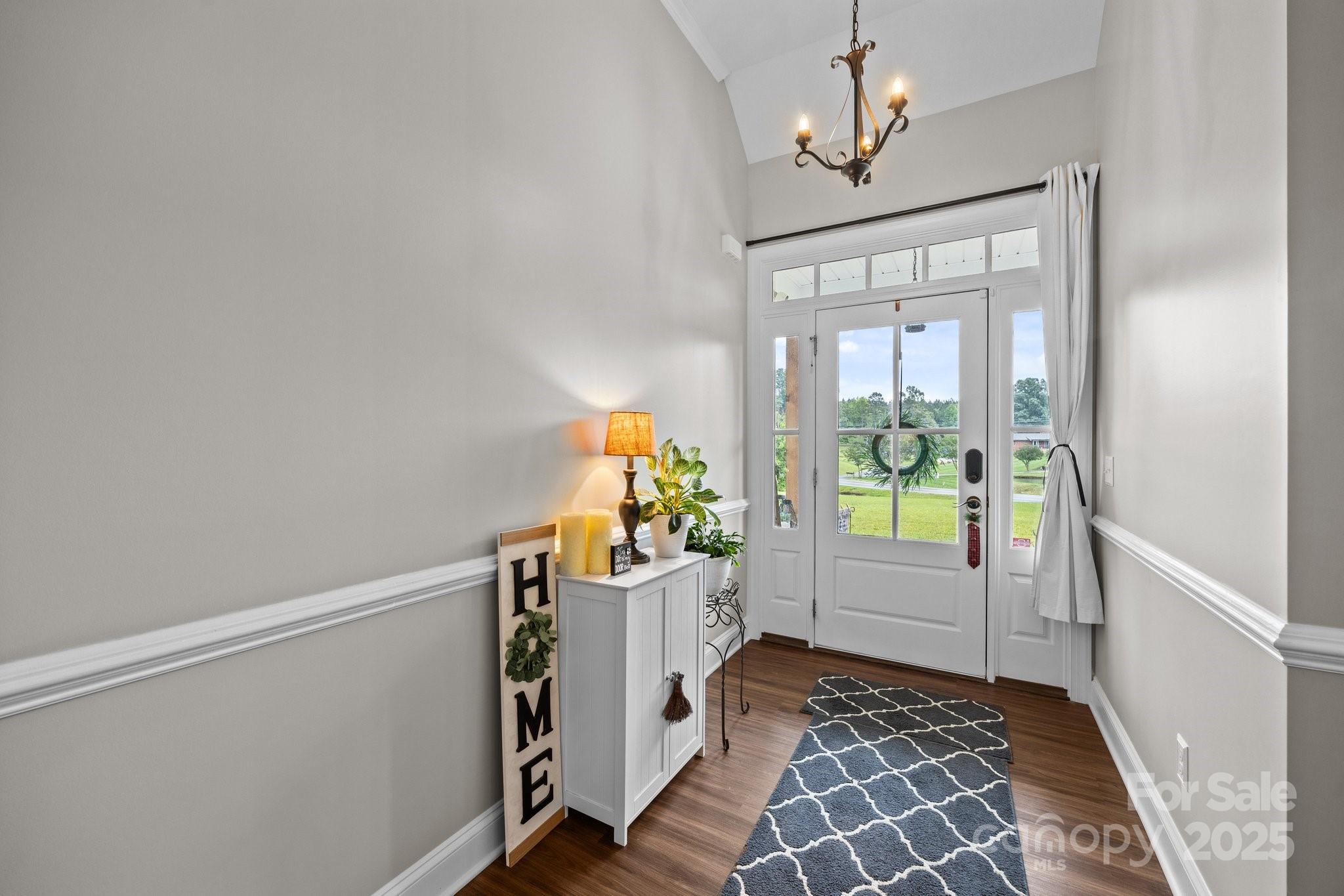 3855 East Holly Grove Road Lexington, NC 27292 - Photo 4 of 42 a view of an entryway with wooden floor