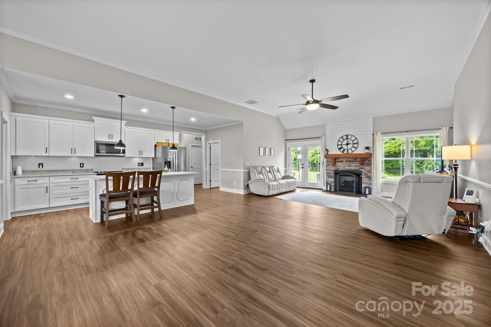 3855 East Holly Grove Road Lexington, NC 27292 - Photo 5 of 42 a living room with furniture and a wooden floor