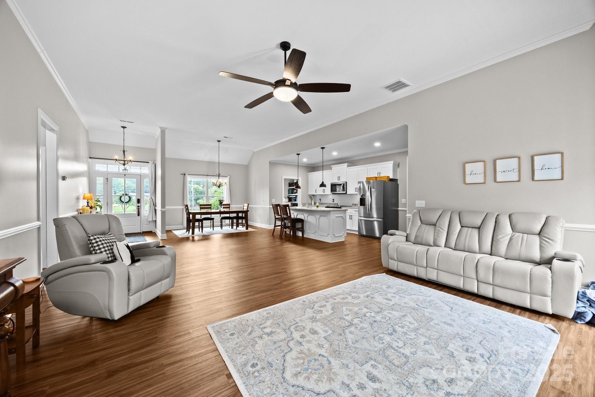 3855 East Holly Grove Road Lexington, NC 27292 - Photo 9 of 42 a living room with furniture and a large window