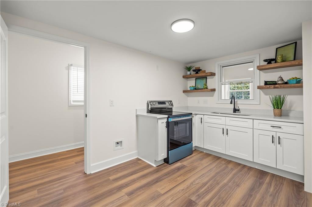 1406 Chatham Drive High Point, NC 27265 - Photo 34 of 48 Lower level Kitchen with entry to lower level Laundry!