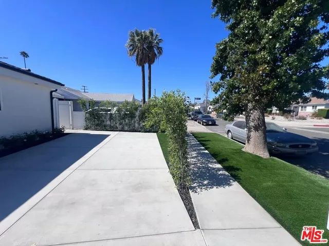 a view of a backyard with a garden
