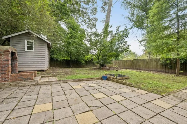 a backyard of a house with lots of green space