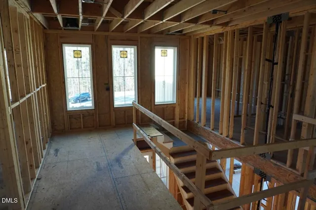 a view of entryway with wooden walls