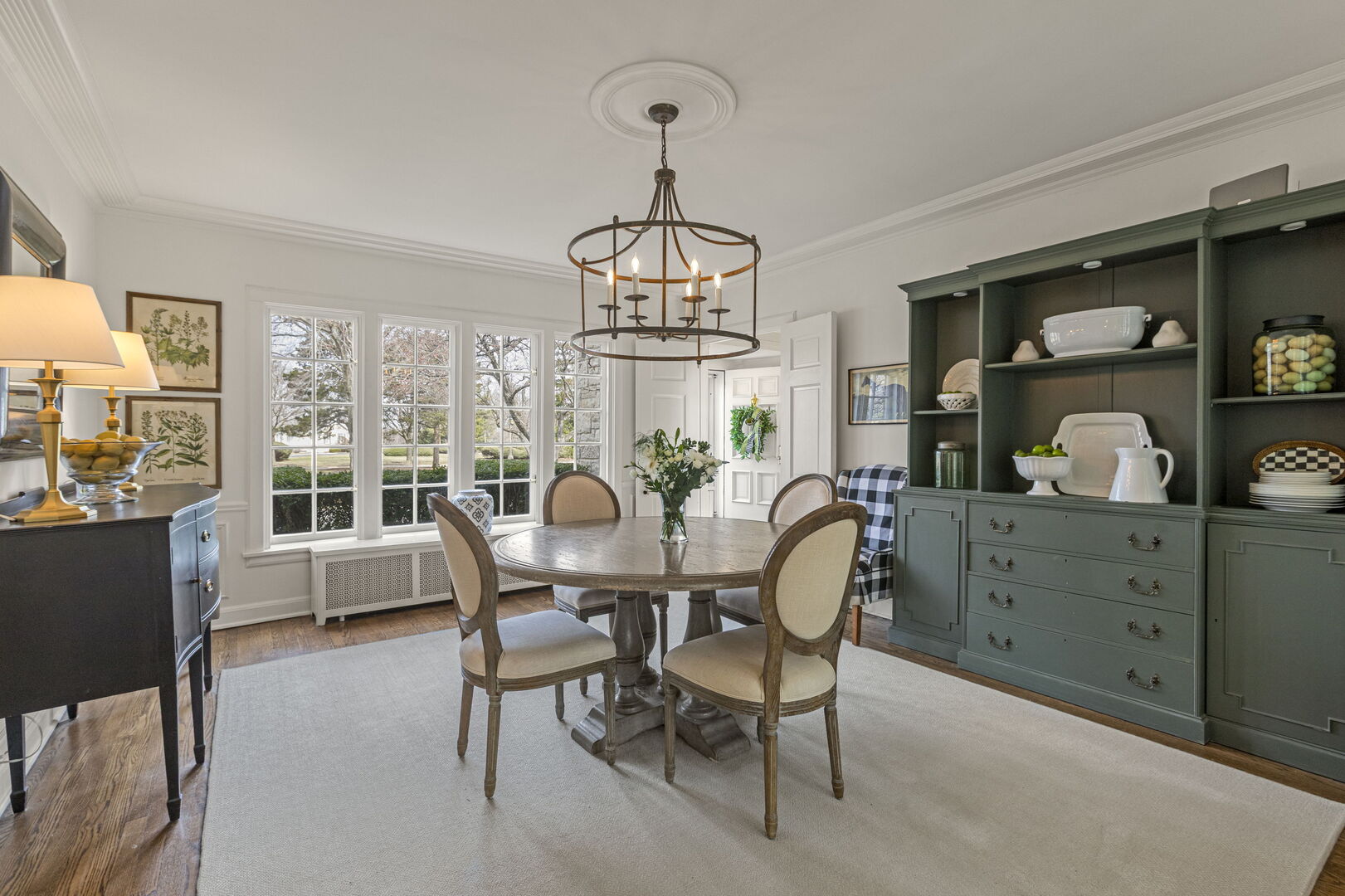 965 Castlegate Court Lake Forest, IL 60045 - Photo 11 of 48 a dining room with furniture a chandelier and window