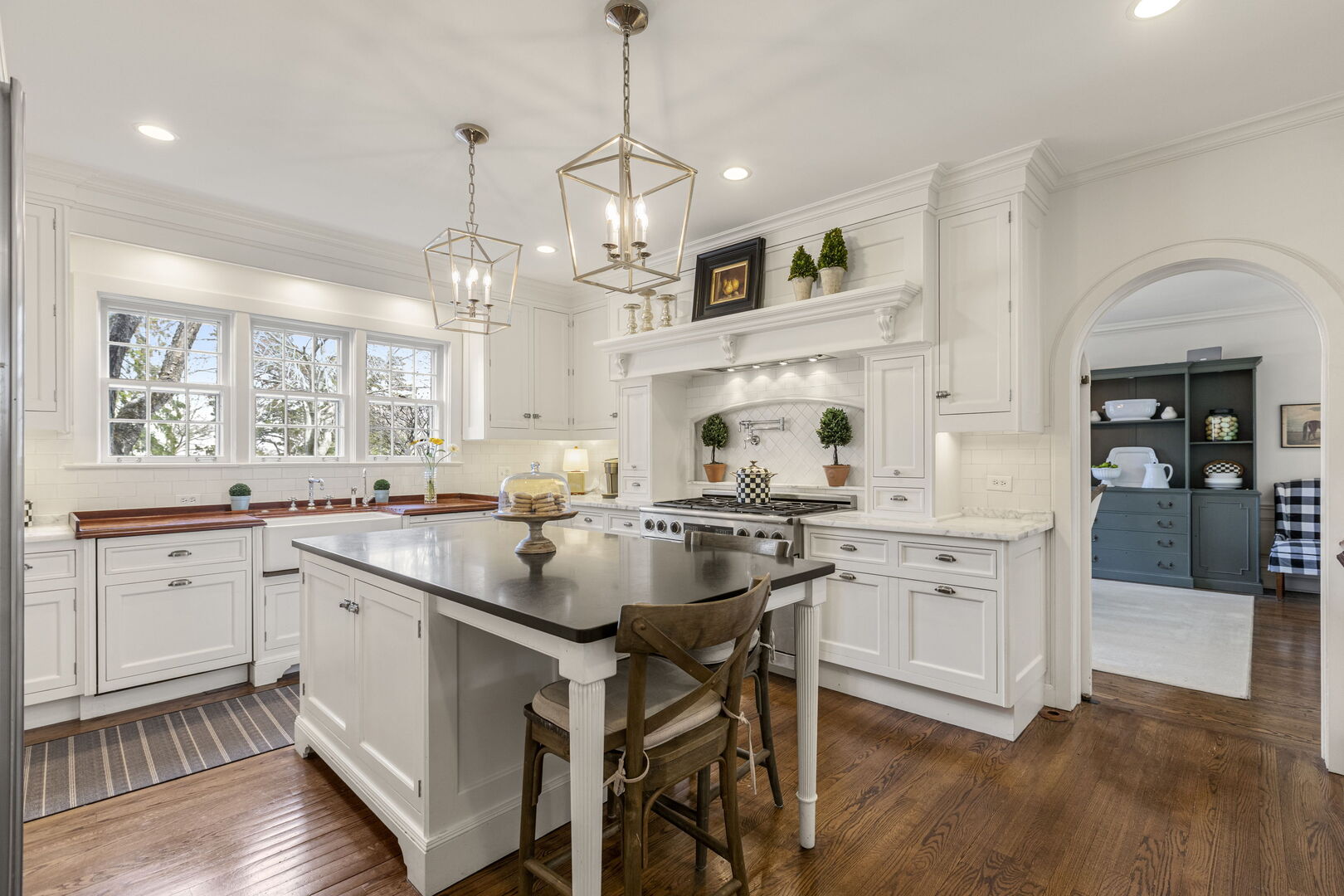 965 Castlegate Court Lake Forest, IL 60045 - Photo 12 of 48 a kitchen with white cabinets and sink