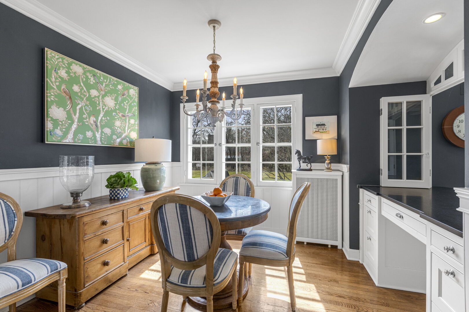965 Castlegate Court Lake Forest, IL 60045 - Photo 20 of 48 a dining room with furniture a chandelier and wooden floor