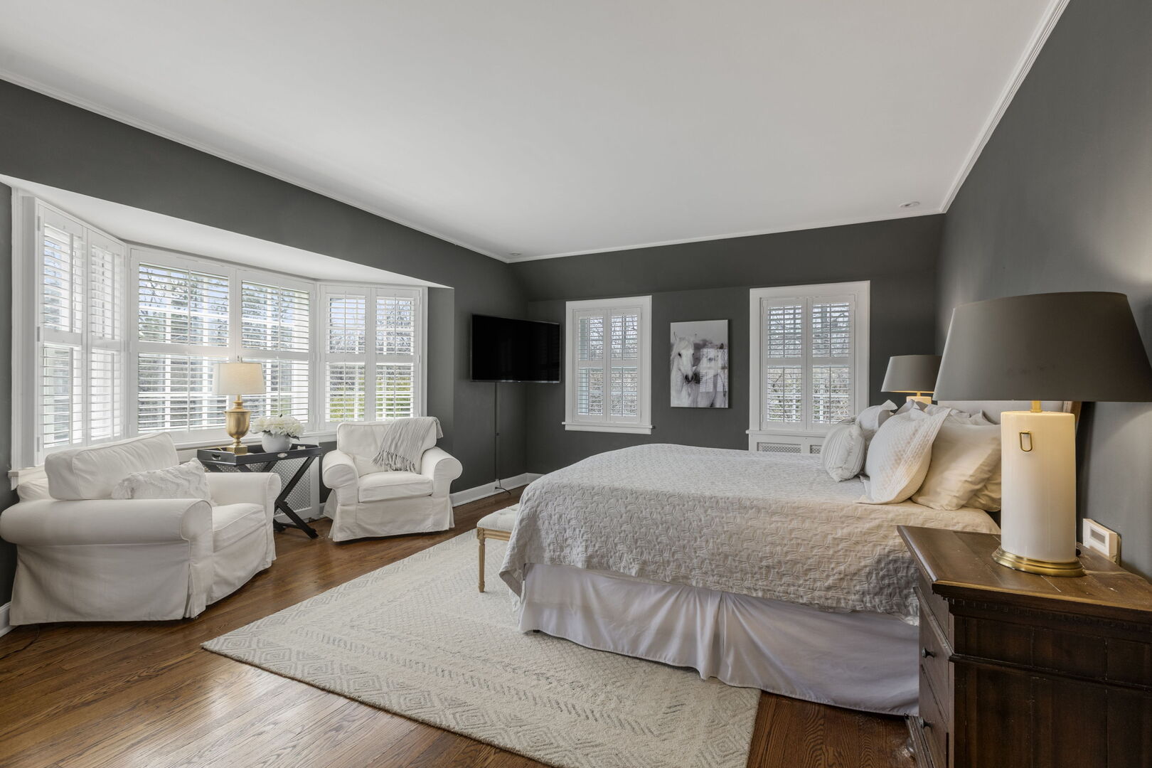 965 Castlegate Court Lake Forest, IL 60045 - Photo 29 of 48 a bedroom with a bed and wooden floor