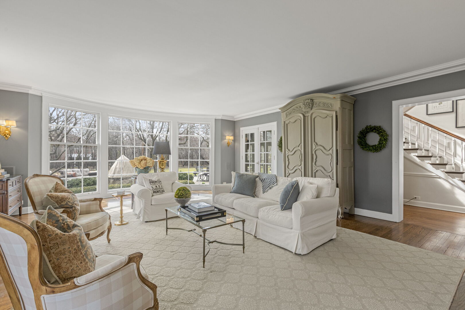 965 Castlegate Court Lake Forest, IL 60045 - Photo 8 of 48 a living room with furniture and a large window