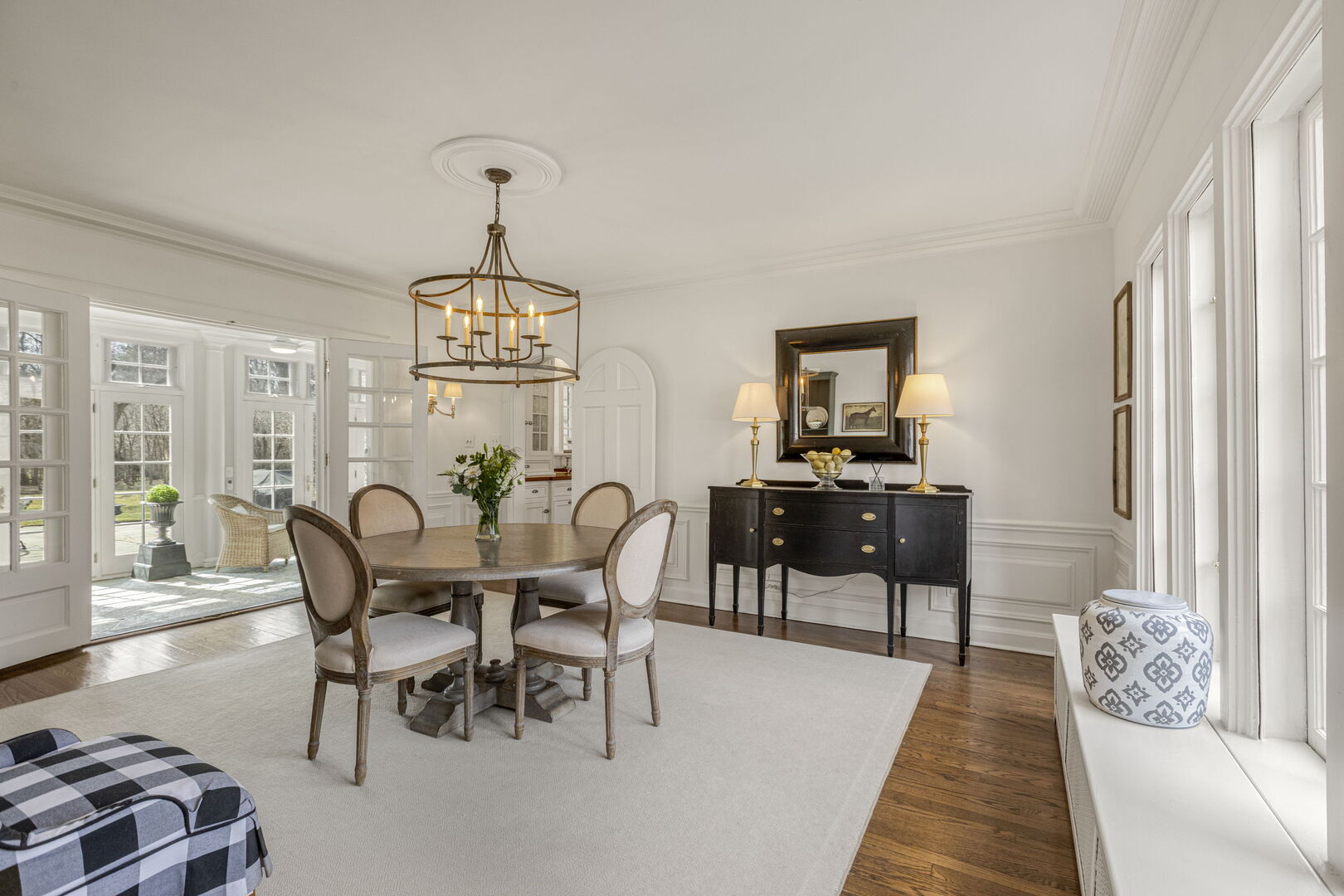 965 Castlegate Court Lake Forest, IL 60045 - Photo 10 of 48 a dining room with furniture a chandelier and wooden floor