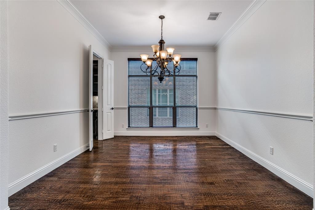 900 Jessica Lane Prosper, TX 75078 - Photo 13 of 40 a view of a room with wooden floor chandelier and windows