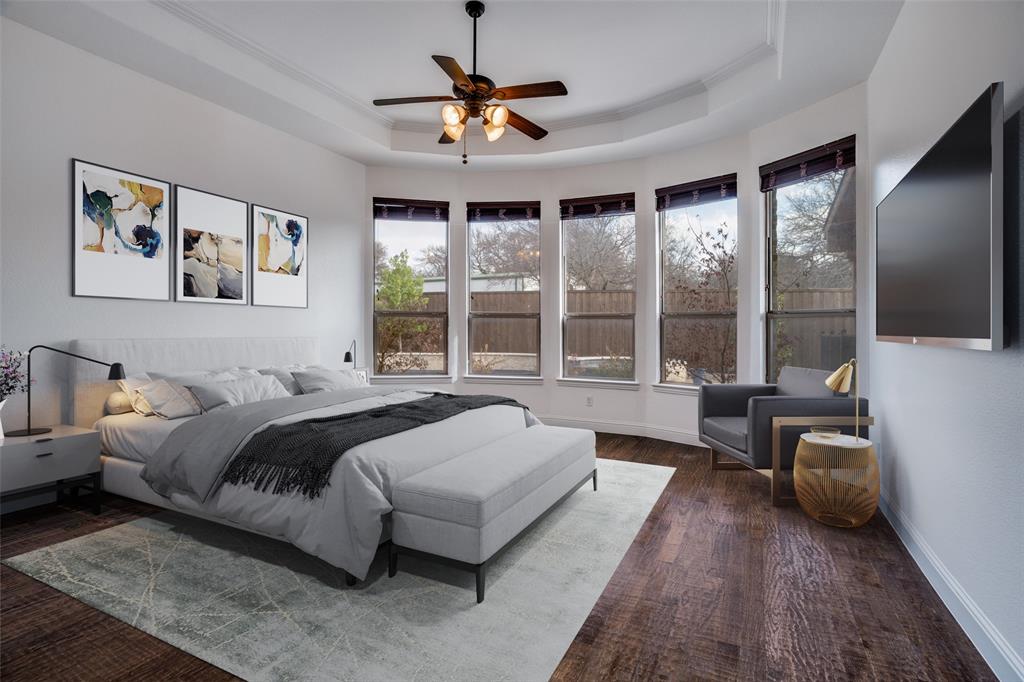 900 Jessica Lane Prosper, TX 75078 - Photo 16 of 40 a spacious bedroom with a large bed and a large window