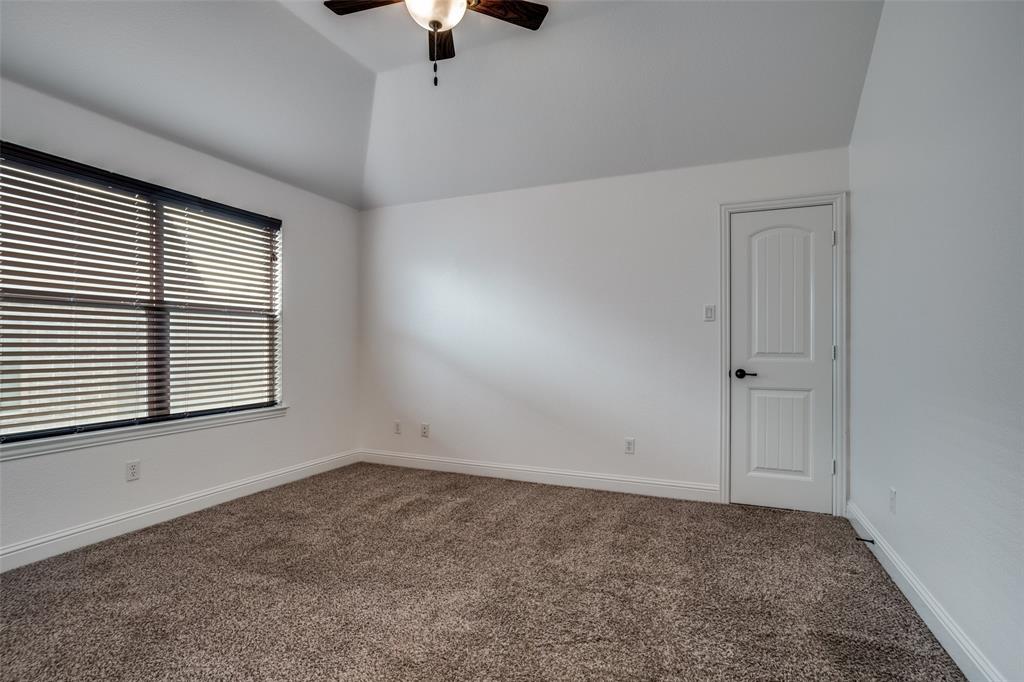 900 Jessica Lane Prosper, TX 75078 - Photo 21 of 40 an empty room with a window