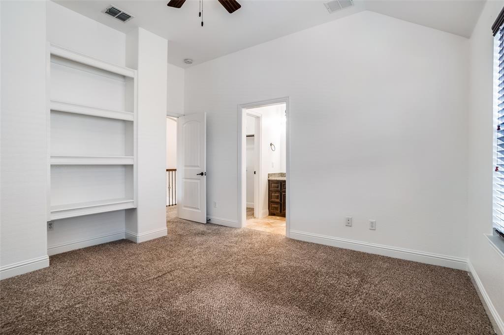 900 Jessica Lane Prosper, TX 75078 - Photo 26 of 40 a view of an empty room with a closet