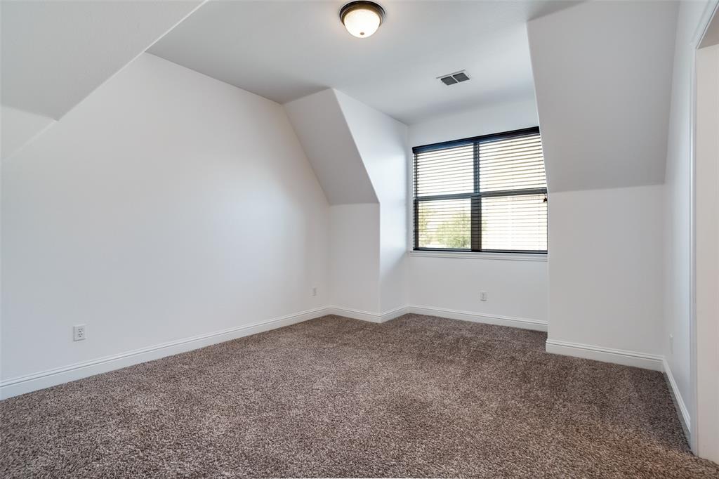 900 Jessica Lane Prosper, TX 75078 - Photo 28 of 40 an empty room with windows and closet
