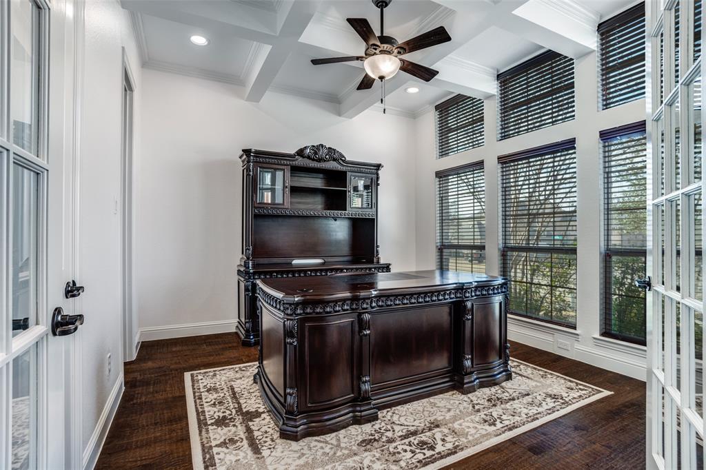 900 Jessica Lane Prosper, TX 75078 - Photo 5 of 40 a kitchen with stainless steel appliances a stove a microwave and a rug