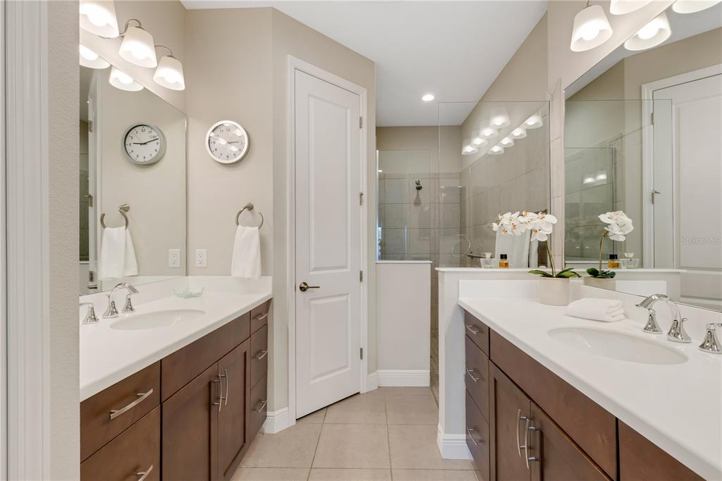 3325 Azurite Way Lakewood Ranch, FL 34211 - Photo 21 of 46 a bathroom with a sink and a mirror