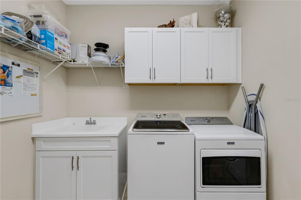 3325 Azurite Way Lakewood Ranch, FL 34211 - Photo 23 of 46 a utility room with dryer and washer