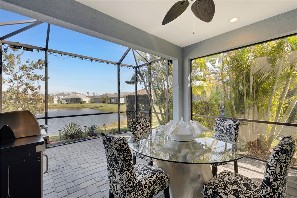3325 Azurite Way Lakewood Ranch, FL 34211 - Photo 4 of 46 a dining room with a table and chairs
