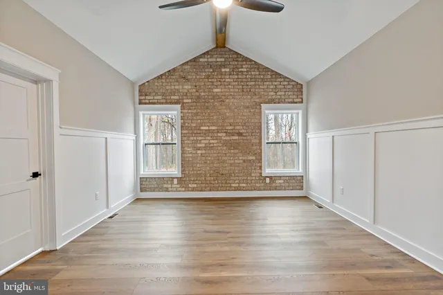 a view of a room with racks on the wall