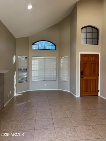 a view of an empty room and window