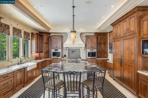 a view of a hallway view with staircase