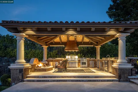 a view of a chairs and tables in the patio