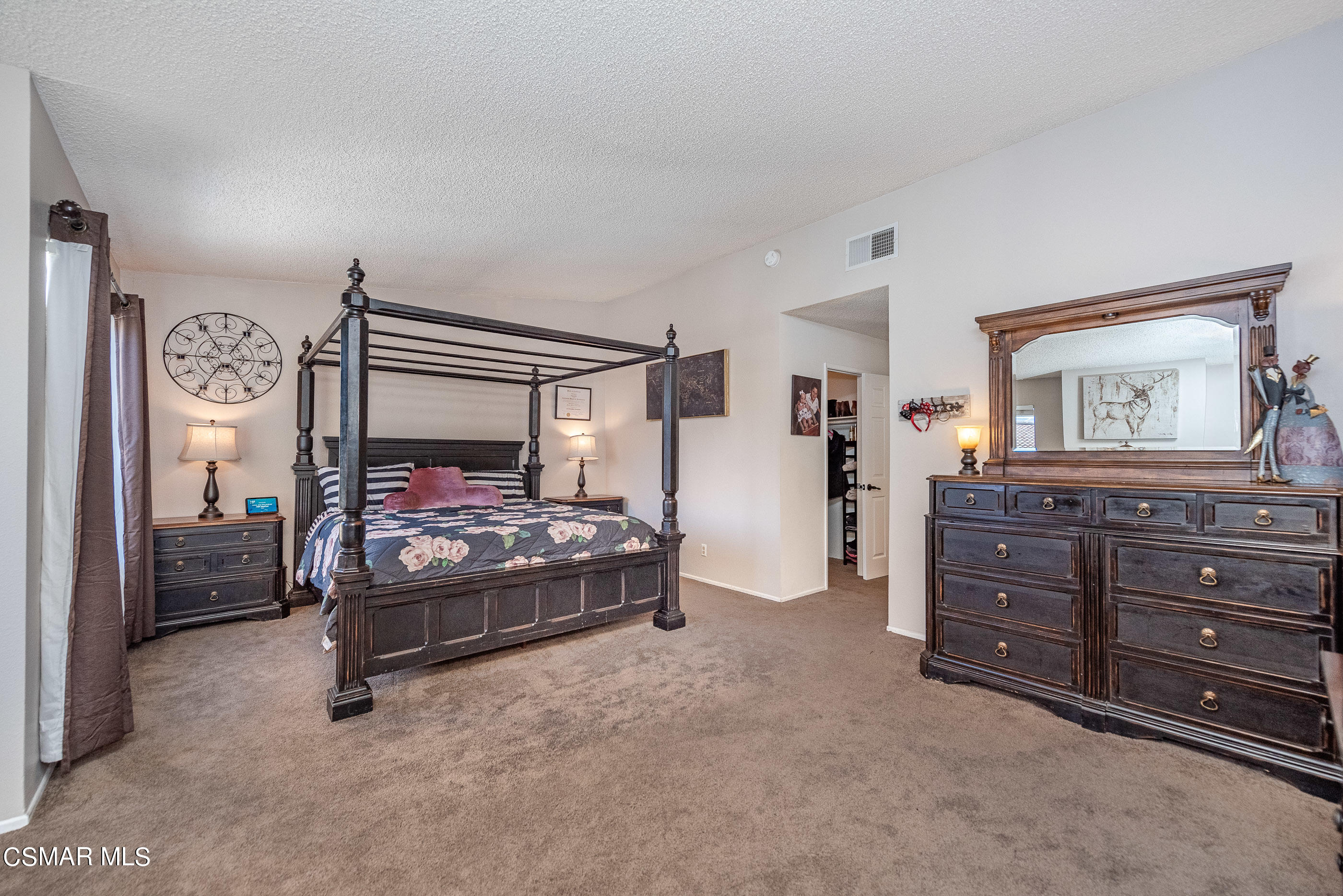 1928 Stow Street Simi Valley, CA 93063 - Photo 18 of 31 a bedroom with a bed and a dresser in it