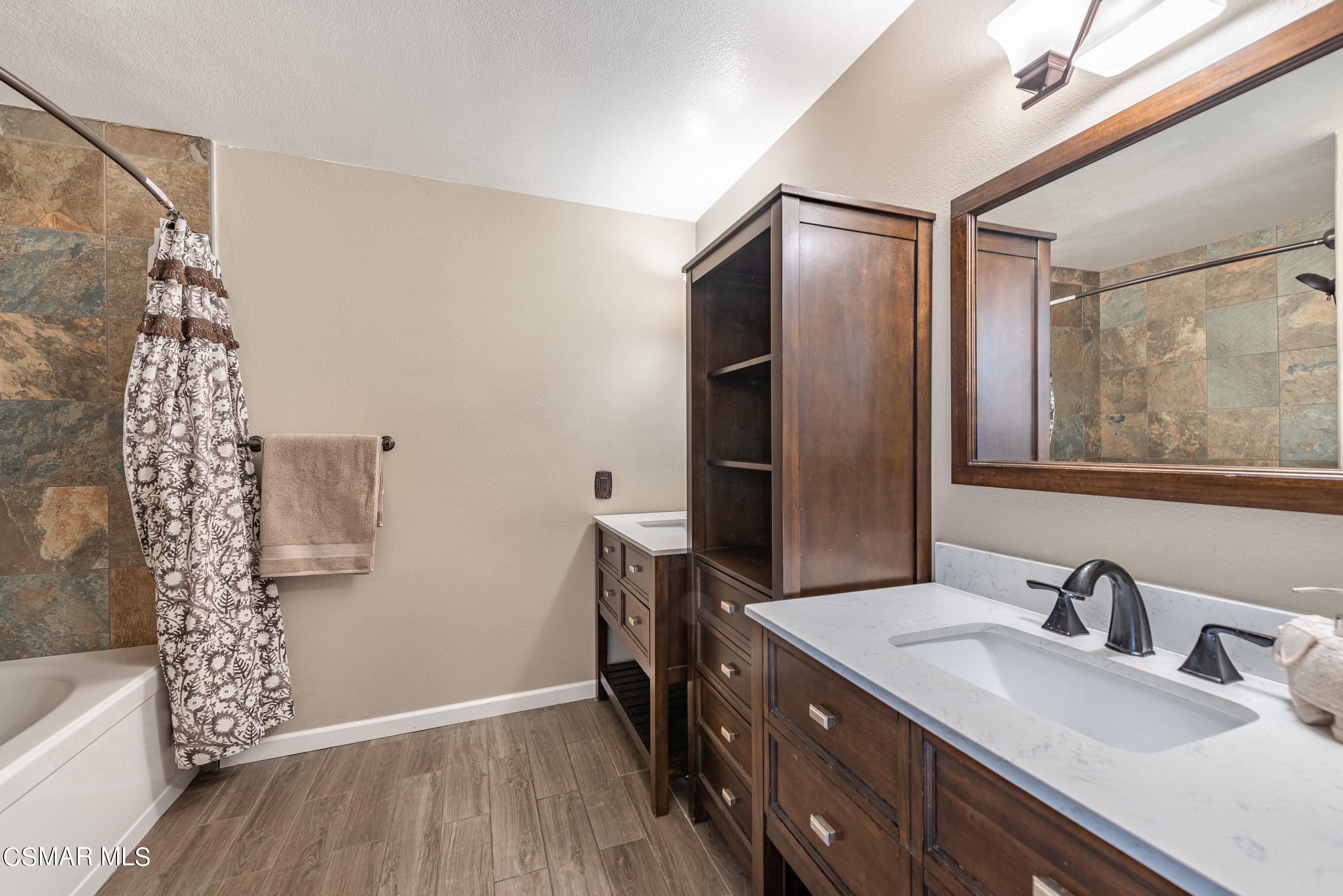 1928 Stow Street Simi Valley, CA 93063 - Photo 19 of 31 a bathroom with double vanity sink and two mirror