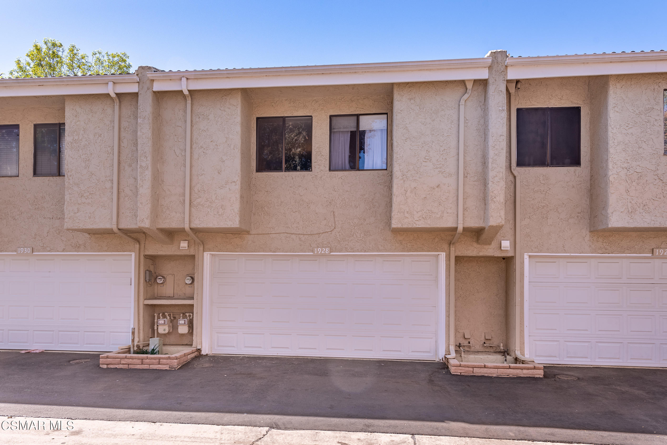 1928 Stow Street Simi Valley, CA 93063 - Photo 27 of 31 a front view of a house with a yard