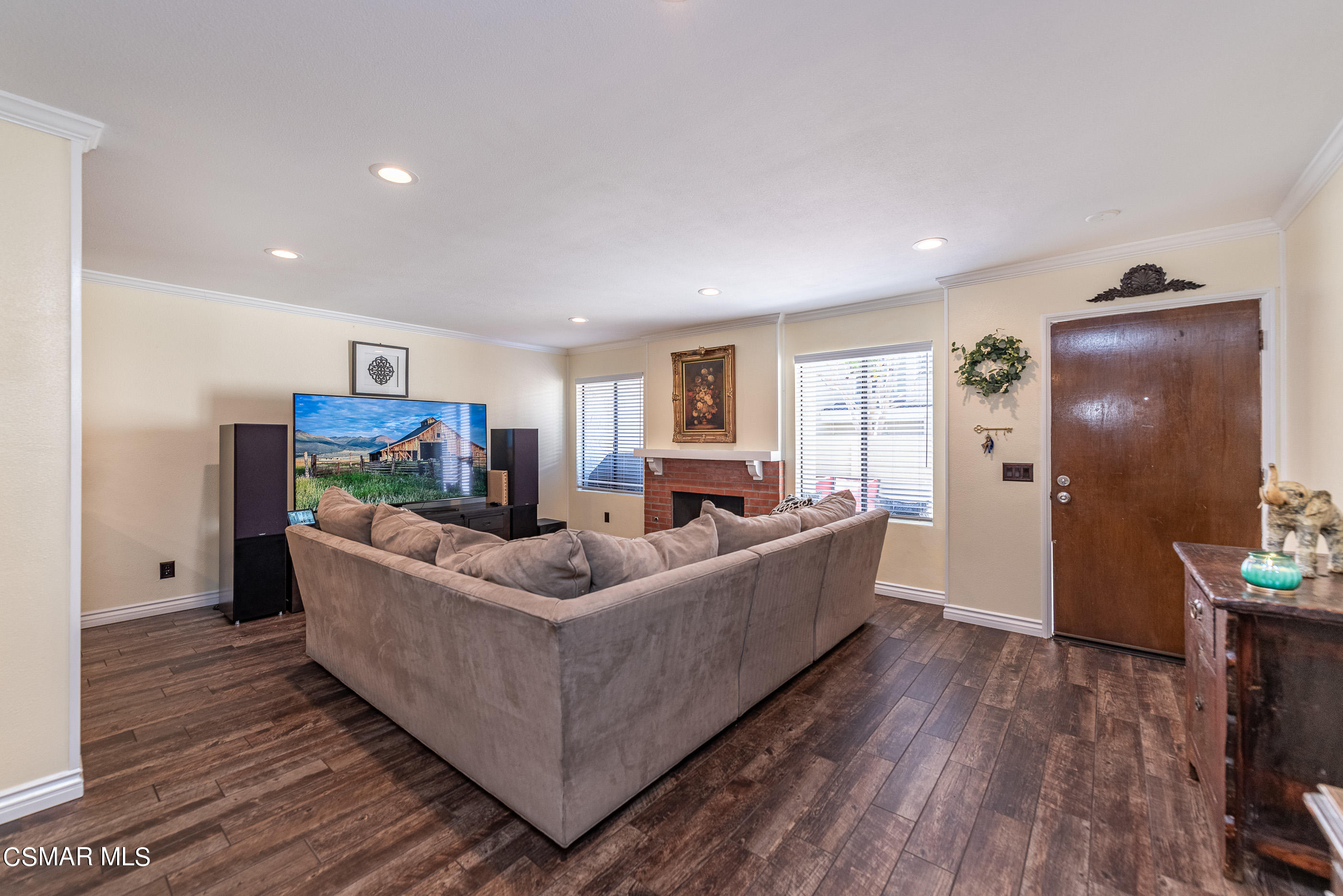 1928 Stow Street Simi Valley, CA 93063 - Photo 6 of 31 a living room with furniture and a flat screen tv