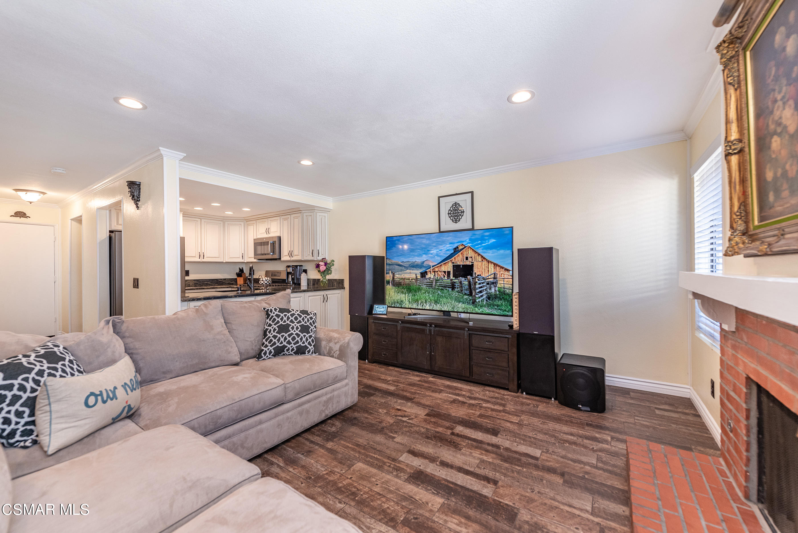 1928 Stow Street Simi Valley, CA 93063 - Photo 9 of 31 a living room with furniture and a flat screen tv