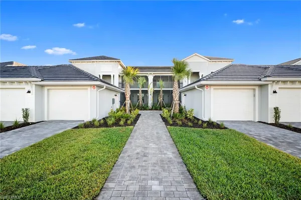a view of a back yard of the house