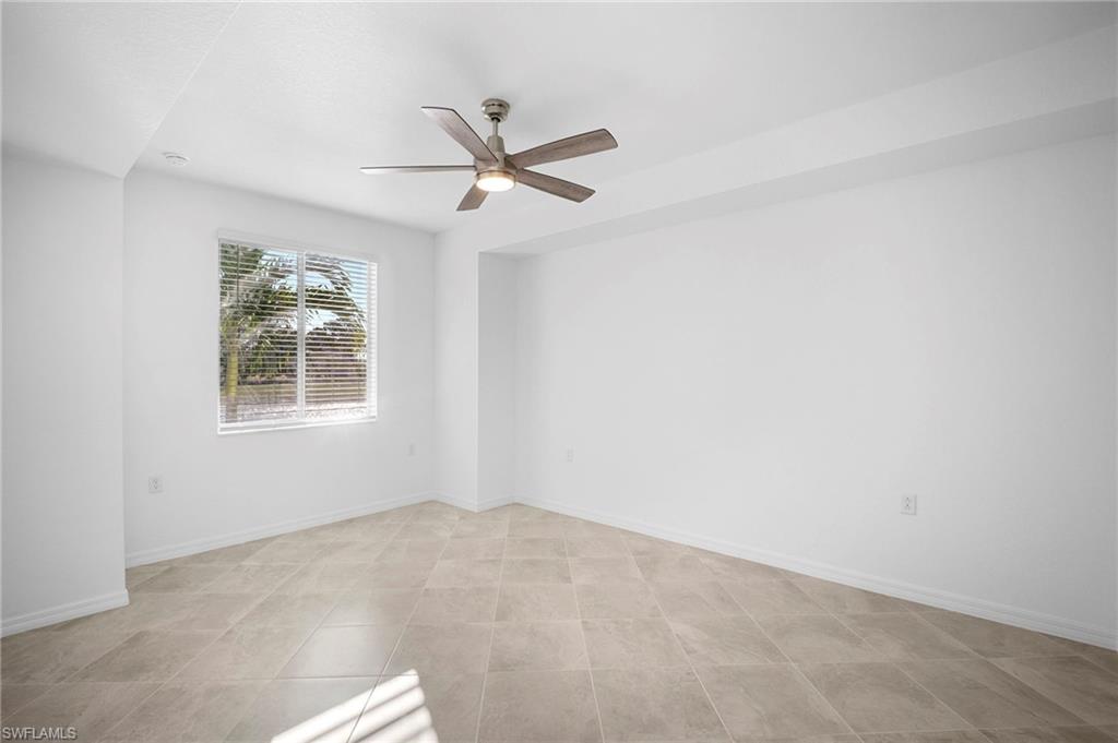 15155 Bluffton Lane, Unit 517 Babcock Ranch, FL 33982 - Photo 29 of 39 a view of a big room with carpet and windows