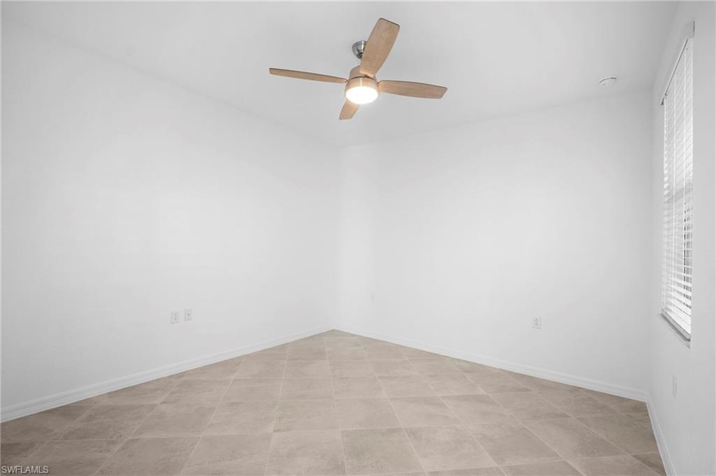 15155 Bluffton Lane, Unit 517 Babcock Ranch, FL 33982 - Photo 32 of 39 an empty room with a window