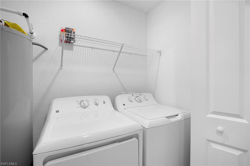 15155 Bluffton Lane, Unit 517 Babcock Ranch, FL 33982 - Photo 34 of 39 a utility room with dryer and washer