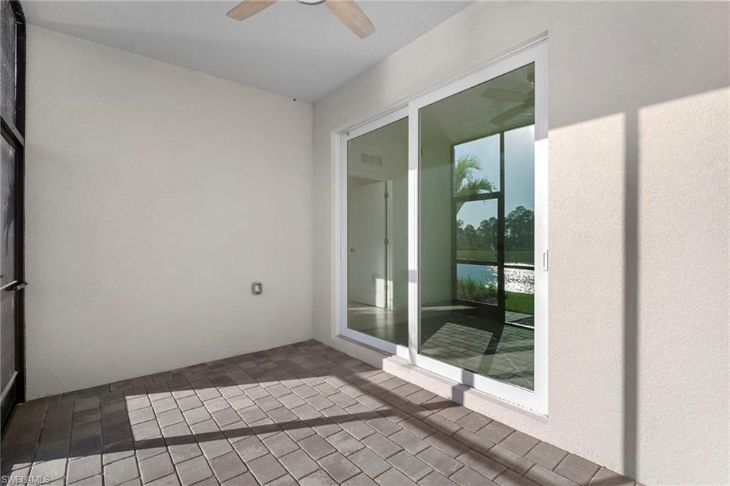 15155 Bluffton Lane, Unit 517 Babcock Ranch, FL 33982 - Photo 8 of 39 a view of a bathroom with a glass door