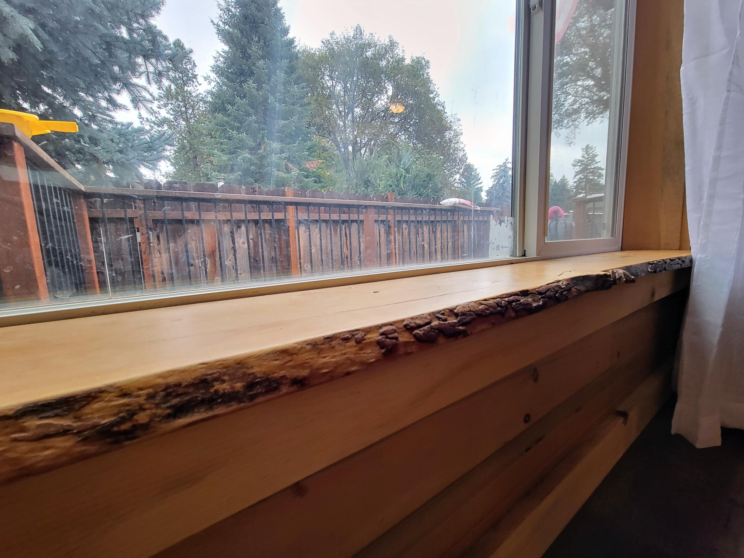 447 Fee Street Butte Falls, OR 97522 - Photo 7 of 16 Live edge window sill in living room.
