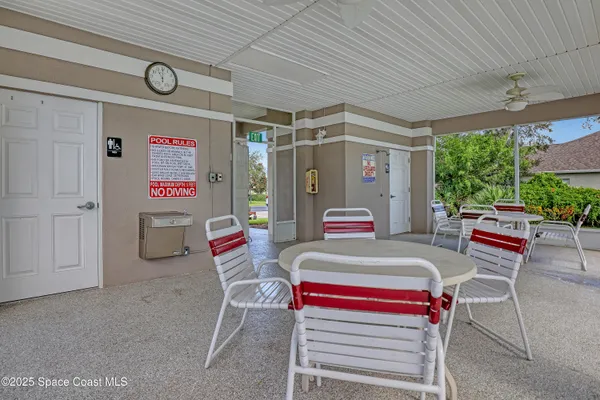 a outdoor space that has a couch and a table in it