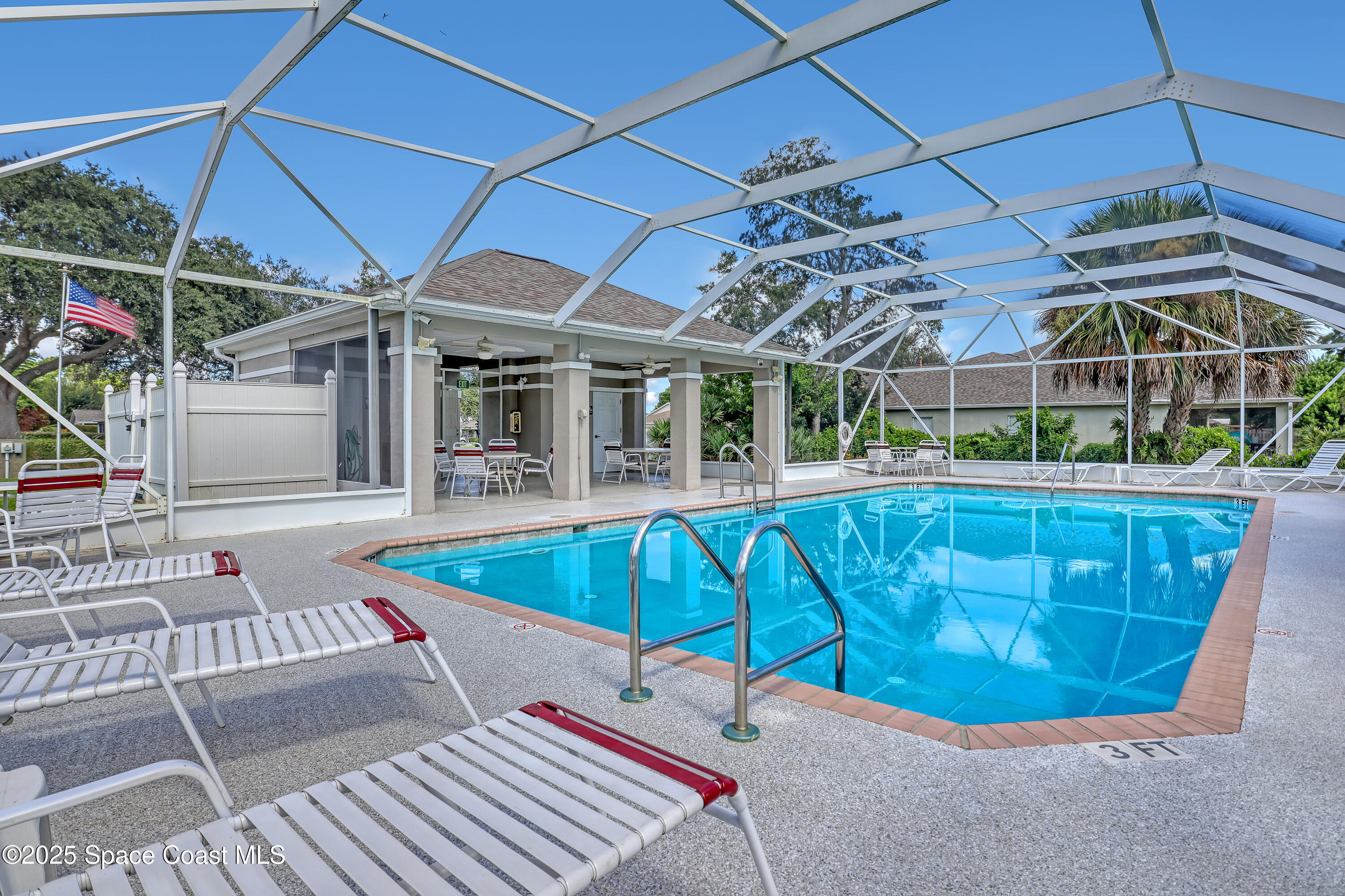 2210 Spring Creek Circle Palm Bay, FL 32905 - Photo 38 of 39 a view of a patio with a table and chairs