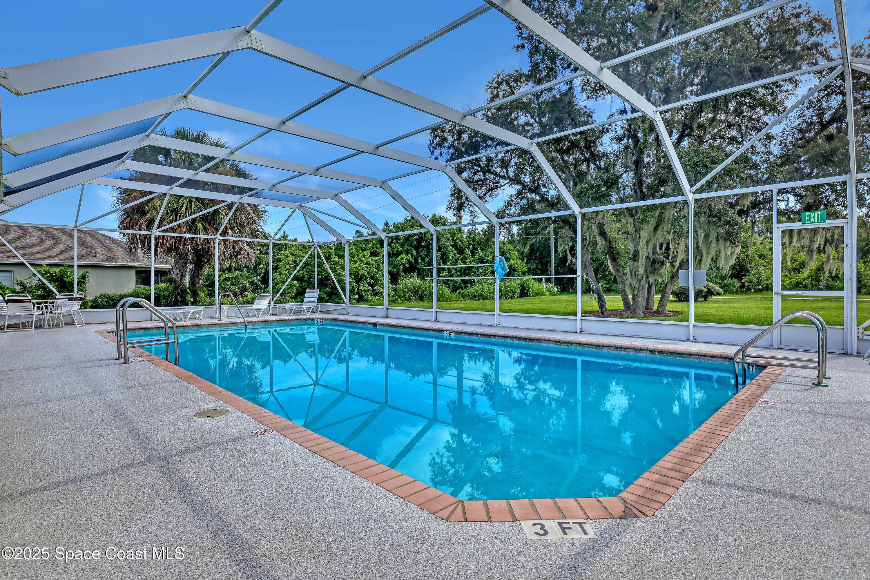 2210 Spring Creek Circle Palm Bay, FL 32905 - Photo 39 of 39 a view of a backyard with swimming pool