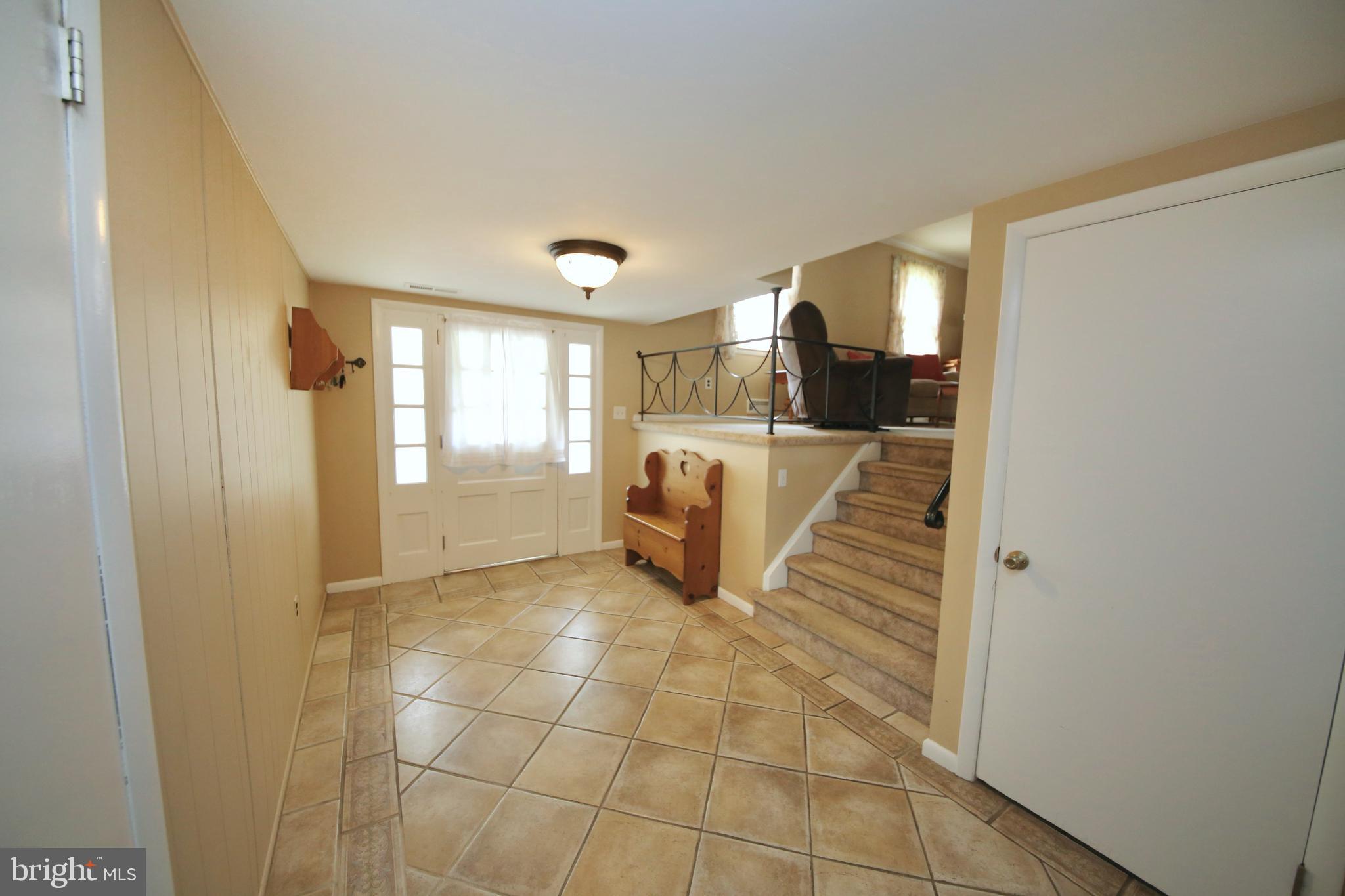 24 Homestead Road Stratford, NJ 08084 - Photo 4 of 39 Large foyer entrance