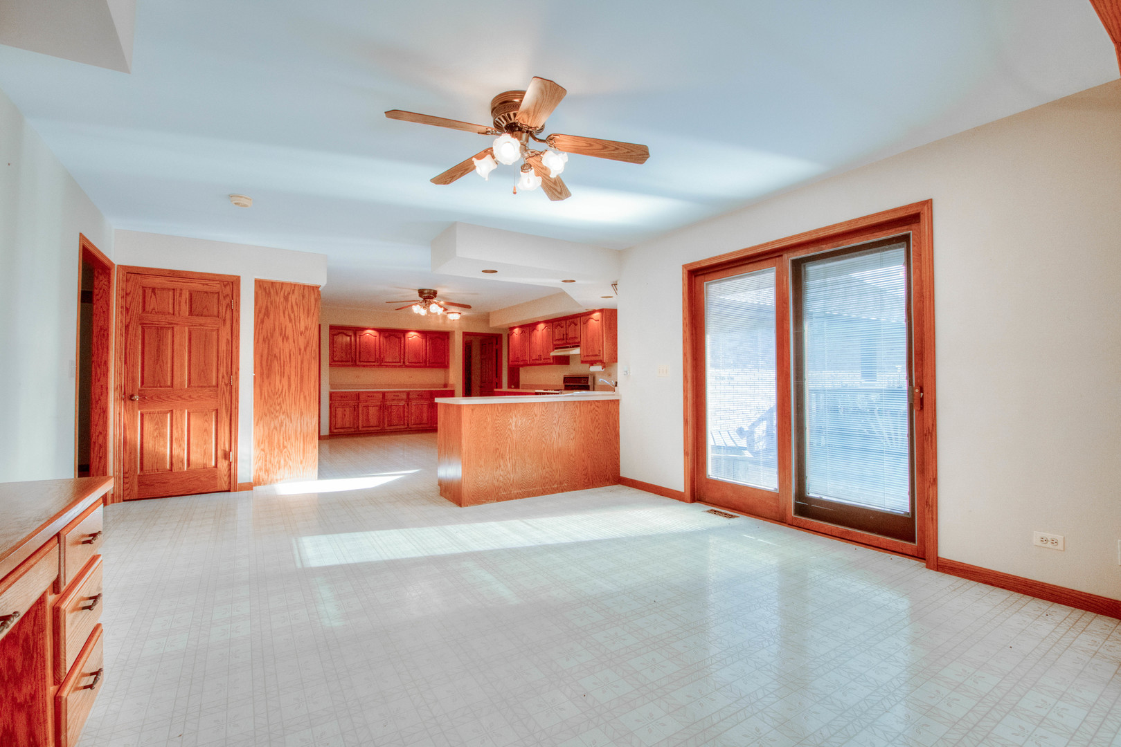 20501 Hebron Road Harvard, IL 60033 - Photo 19 of 49 a view of a livingroom with a ceiling fan and window