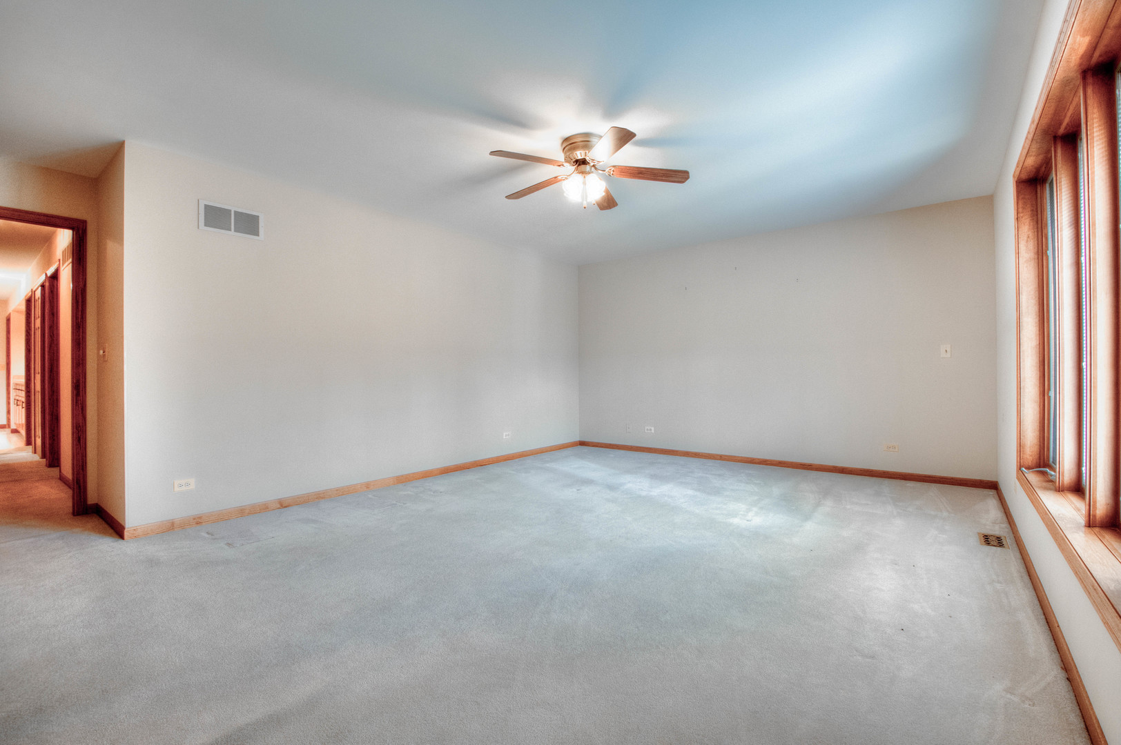 20501 Hebron Road Harvard, IL 60033 - Photo 23 of 49 an empty room with windows and fan