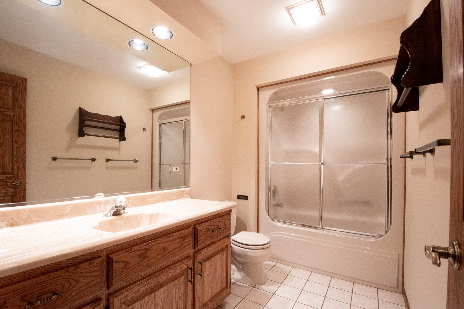 20501 Hebron Road Harvard, IL 60033 - Photo 31 of 49 a bathroom with a sink a toilet and shower