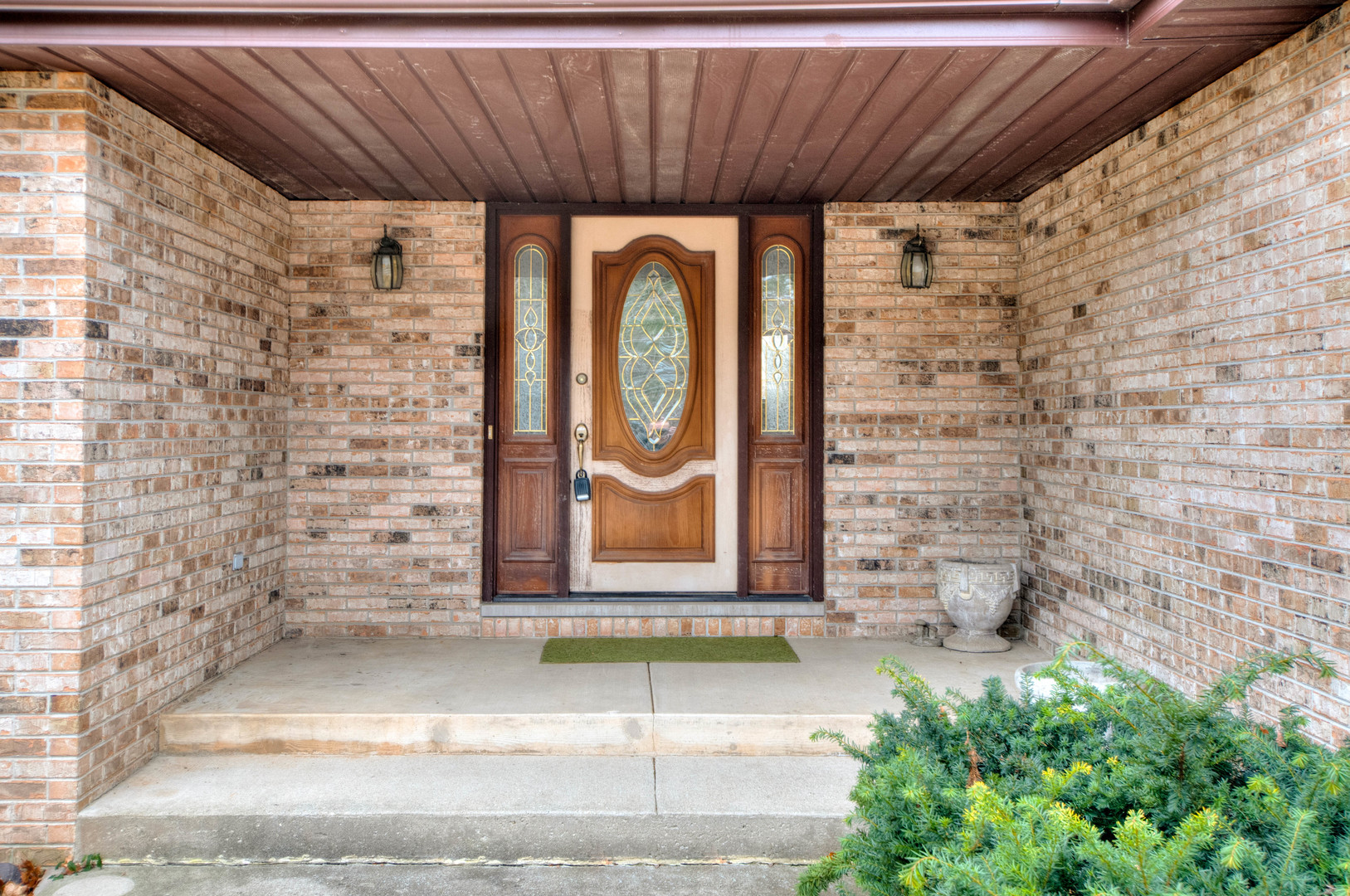 20501 Hebron Road Harvard, IL 60033 - Photo 6 of 49 a front view of a house with a outdoor space