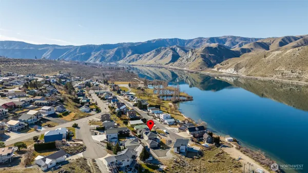 a view of a city with a lake