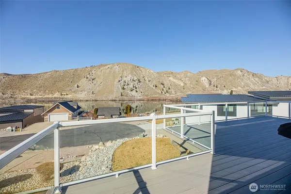a view of a balcony with an ocean view