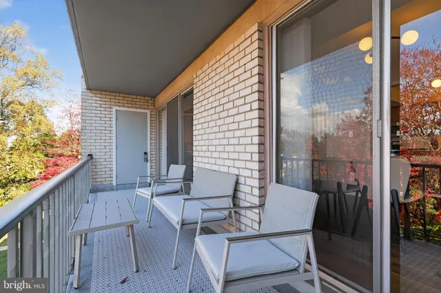 a view of balcony with wooden floor