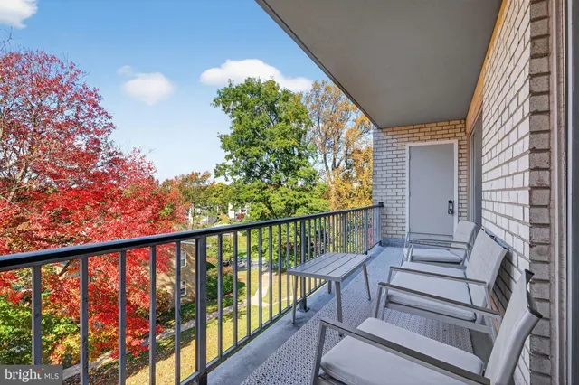 front view of a house with a garden