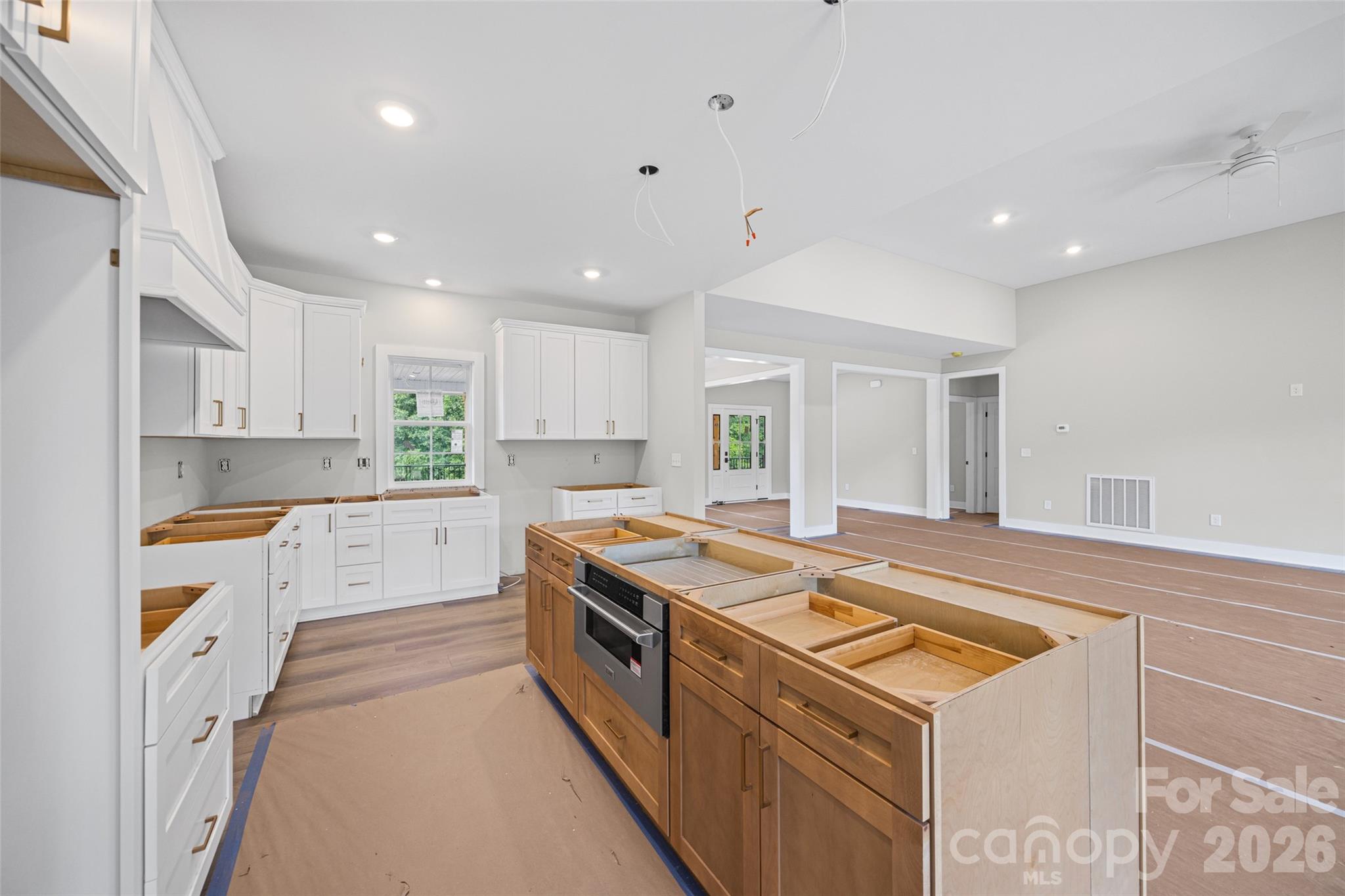 640 Edwards Road Fort Lawn, SC 29714 - Photo 7 of 39 a kitchen with a stove sink and cabinets